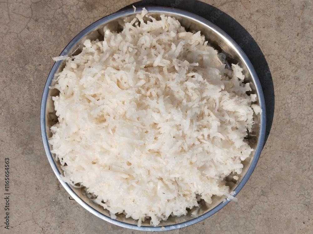 Fresh grated Horseradish on surface background (detailed close-up shot) Fresh grated Horseradish on surface background (detailed close-up shot)