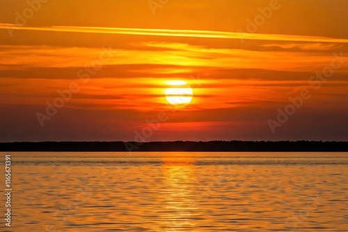 A beautiful sunset over the sea area photo