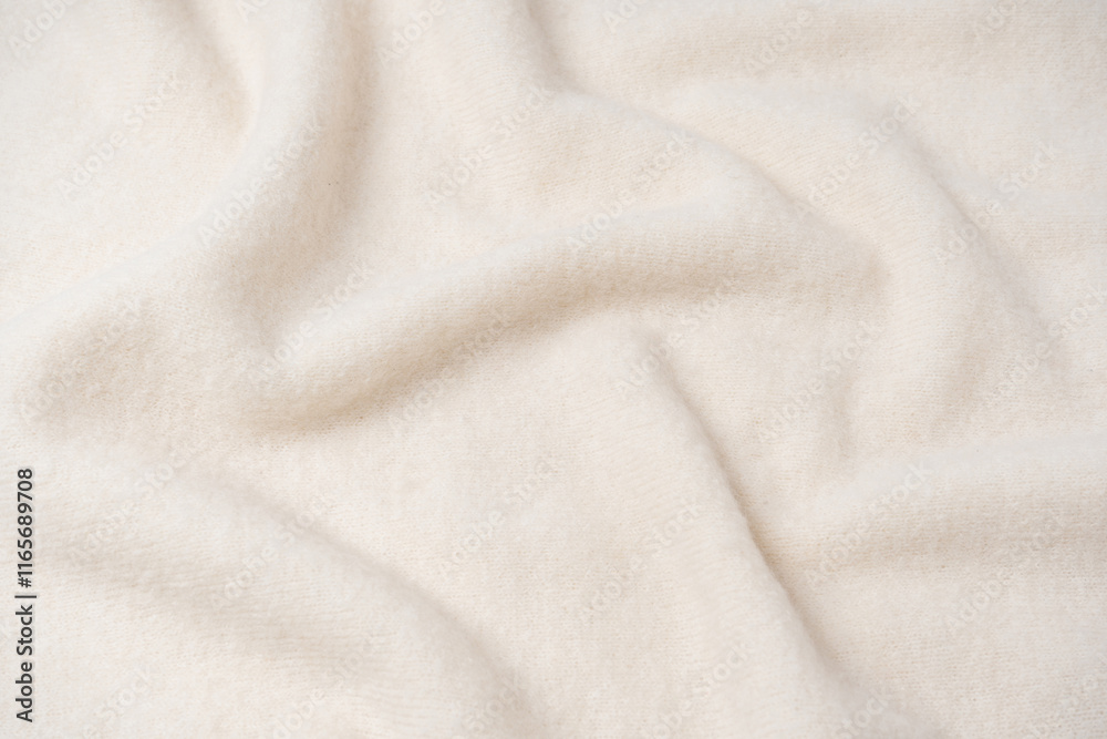 Beige sweater texture as a background.