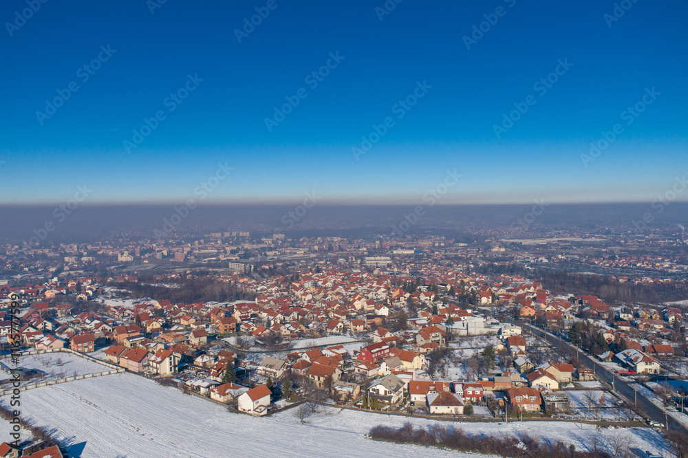 Fototapeta premium Panorama with polluted air of the city of Valjevo