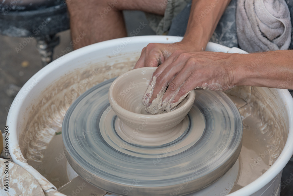 The master teaches young people clay art. The master teaches young people clay art.