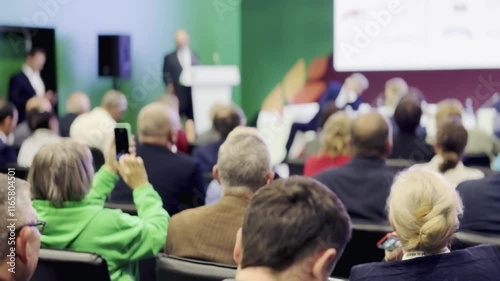 Wallpaper Mural A blurred view of an engaged audience participating in a professional conference or seminar. Torontodigital.ca