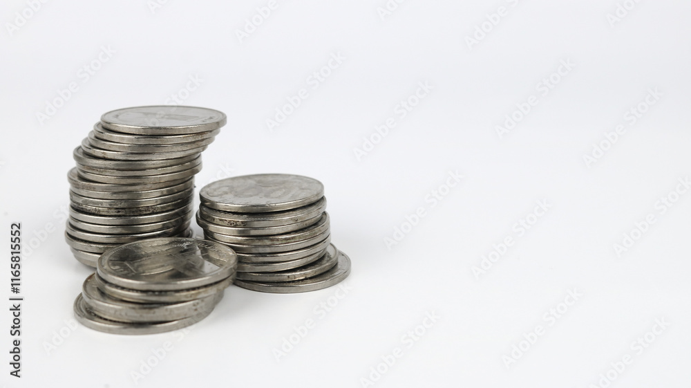 Silver coins stacks isolated on a white background. Indonesian rupiah coin. 1000 rupiah coin. metal money Silver coins stacks isolated on a white background. Indonesian rupiah coin. 1000 rupiah coin. metal money