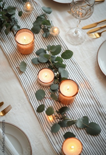 Elegant table setting with greenery and candles for a special dining experience