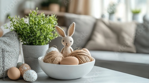 Decorated easter table setting with bunny and eggs in a cozy living room