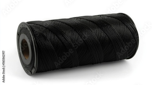 A spool of black thread for sewing and crafting purposes. photo