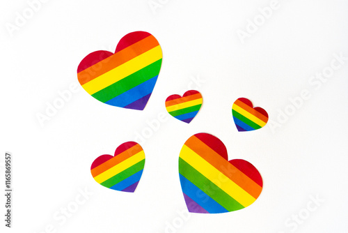 cut out colored paper hearts on white background, transexual colors, lgbt pride concept, big raindow colors heart photo