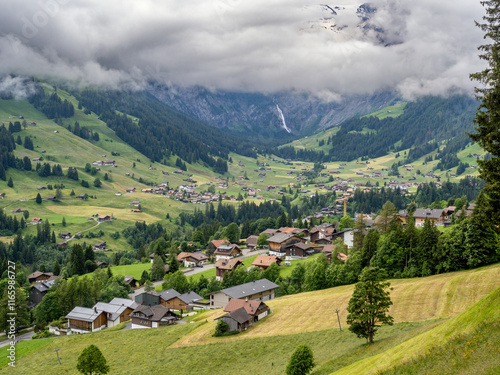 Adelboden town and valley from Daudenfells, Switzerland photo