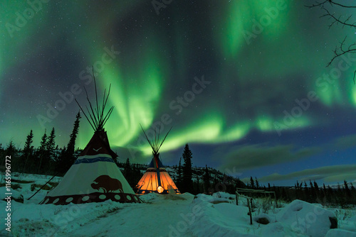Aurora borealis over the mountains, Yukon, Canada