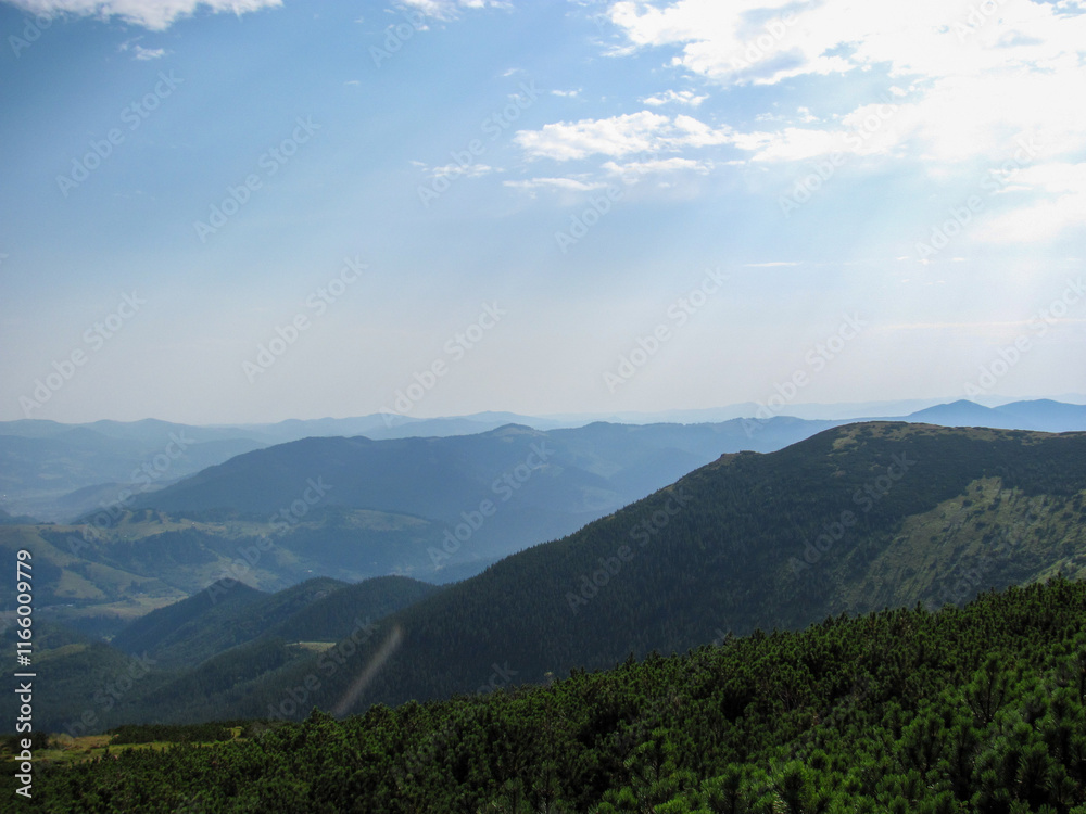 Fototapeta premium Majestic mountains stretch to the horizon