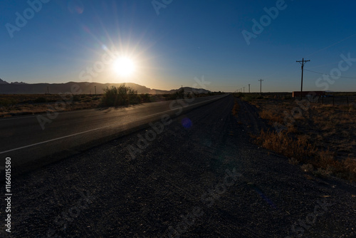 Sunrise over a New Mexico desert road photo