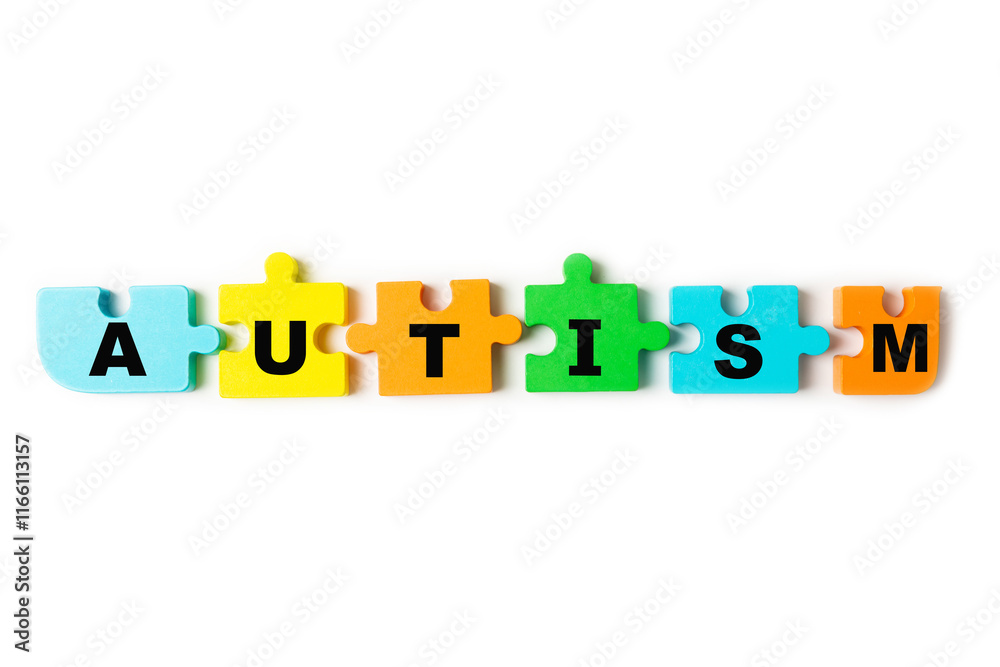Autism awareness day.2 April world autism awareness day background.Design element.Care Awareness campaign for Autism.AUTISM text with colorful wooden puzzles, letters and cubes.Space for text.Top view Autism awareness day.2 April world autism awareness day background.Design element.Care Awareness campaign for Autism.AUTISM text with colorful wooden puzzles, letters and cubes.Space for text.Top view