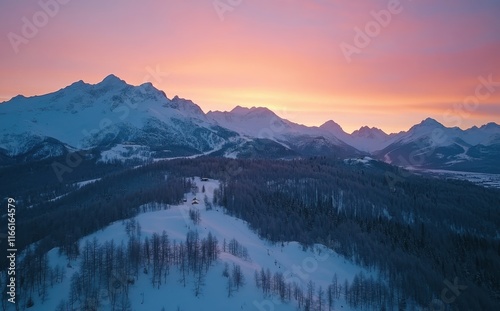 Majestic Winter Sunrise Over Snow-Capped Mountains and Serene Forest Landscape in the Rocky Mountains at Dawn in Vibrant Colors and Soft Light