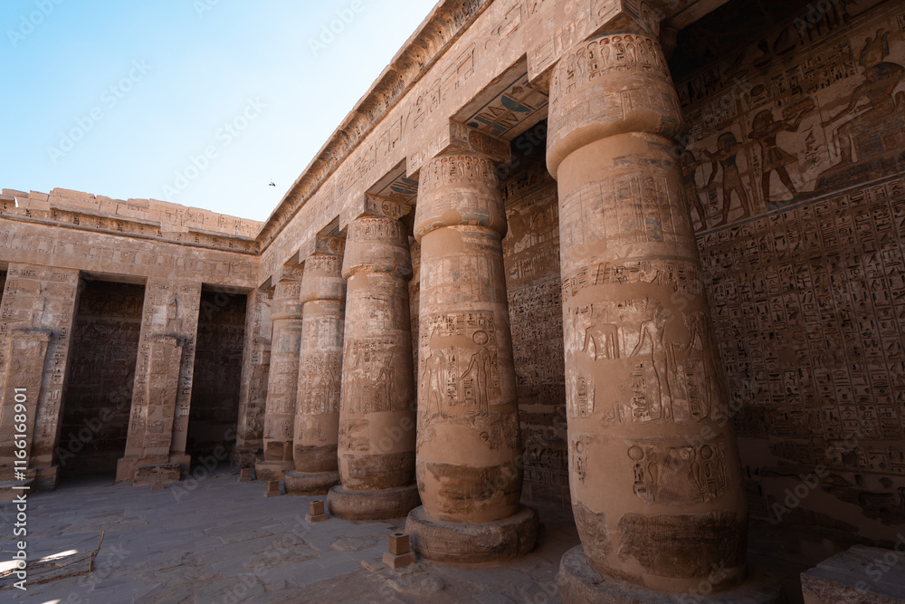Carvings at Temple Medinet Habou in Luxor Egypt Carvings at Temple Medinet Habou in Luxor Egypt