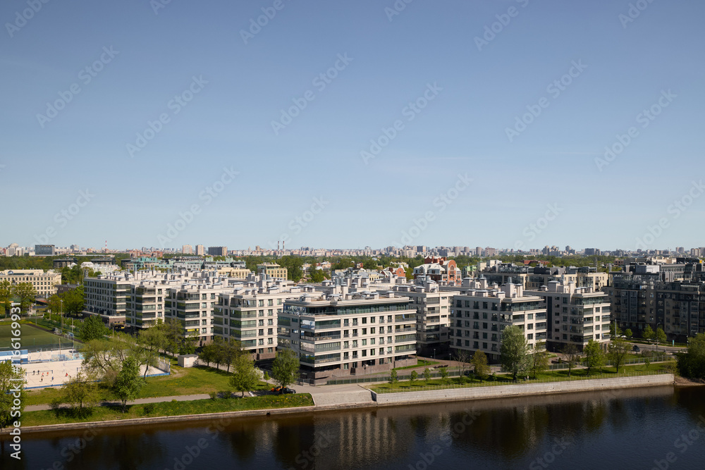 A vibrant and captivating modern urban landscape featuring a picturesque view of a river A vibrant and captivating modern urban landscape featuring a picturesque view of a river