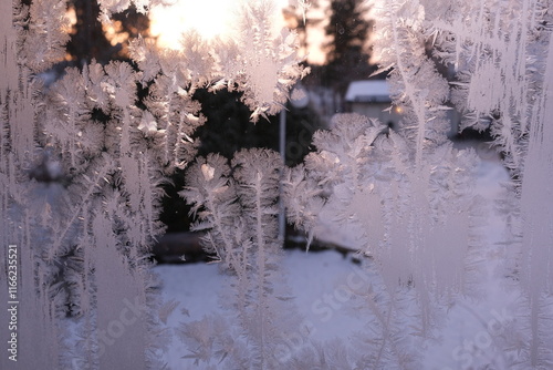 View of the window with frost-covered in Christmas time.