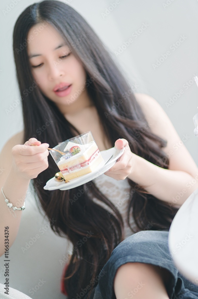 Young Woman Enjoying Dessert with Long Hair and Sweet Treats Young Woman Enjoying Dessert with Long Hair and Sweet Treats