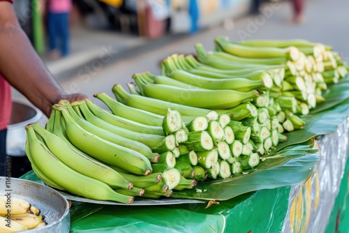 Fresh green plantains stacked on market stall ready for sale vibrant tropical produce concept photo