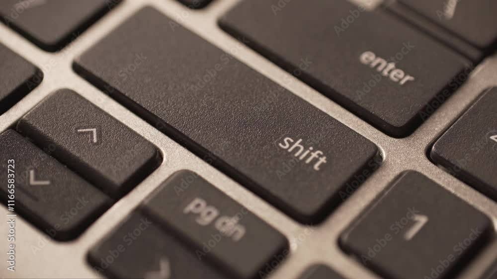 Macro Close up of a computer laptop keyboard in details
Macro Close up of a computer laptop keyboard in details