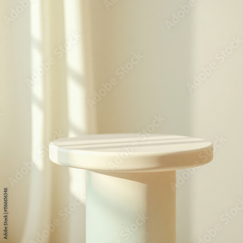 round minimalist pedestal sunlit setting