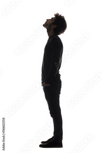 Silhouette of a Man Looking Up from Side View