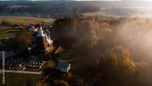 Fototapeta Naklejka Na Ścianę i Meble -  Aerial View of Orthodox Wooden Church in Carpathian Mountains, Poland
