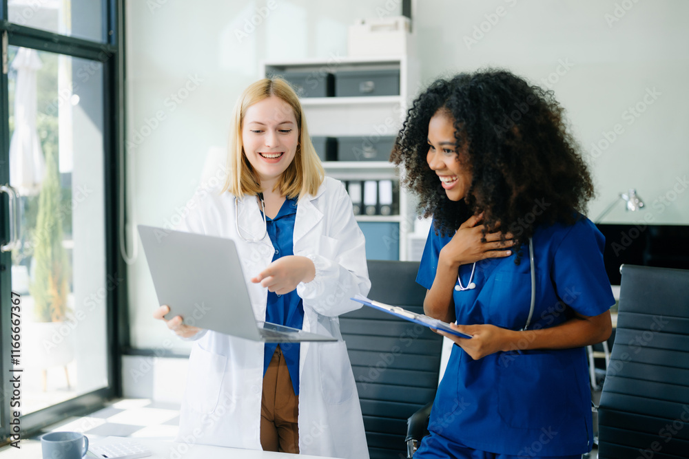  Doctors and nurses using laptops and clipboards, showcasing teamwork, modern healthcare.