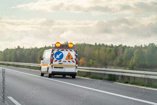 Patrol vehicle ensuring road safety on motorway photo