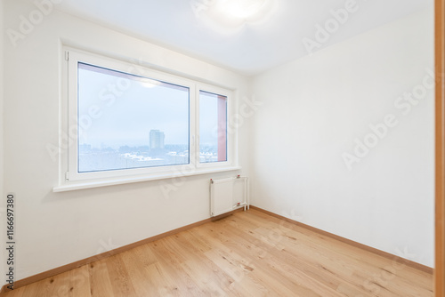 Bright Empty Room With Wooden Flooring and Large Window Overlooking Urban Scenery. Home Interior