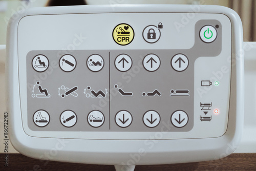 Closeup view of adjustable hospital patient bed position control instruction panel board