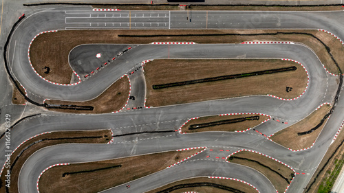 Obraz na płótnie Aerial view race go-kart track, Track for auto racing top view, Car race asphalt and curve street circuit, Go-kart winding race track. w salonie