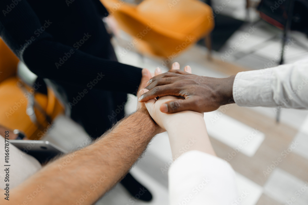 Fototapeta premium Multiracial Team Collaboration with Caucasian, Hispanic, and African American Hands in Unity for Project Meeting