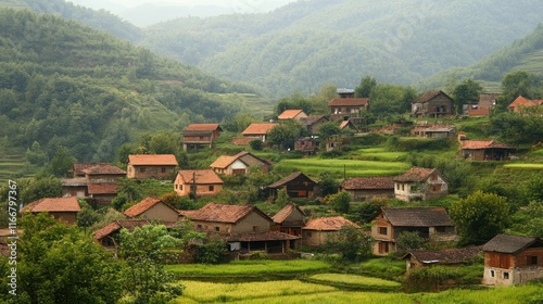 Scenic view of a traditional village nestled in lush green mountains showcasing charming houses and serene rural landscape photo