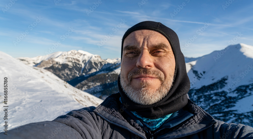 Self-portrait of a tourist in the winter mountains. Self-portrait of a tourist in the winter mountains.
