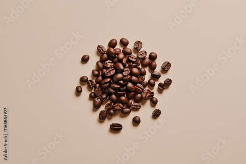 Spilled coffee beans on light brown surface creating a warm and inviting atmosphere for coffee lovers photo