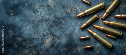 Ammunition background - closeup of different caliber cartridges or bullets with space for text