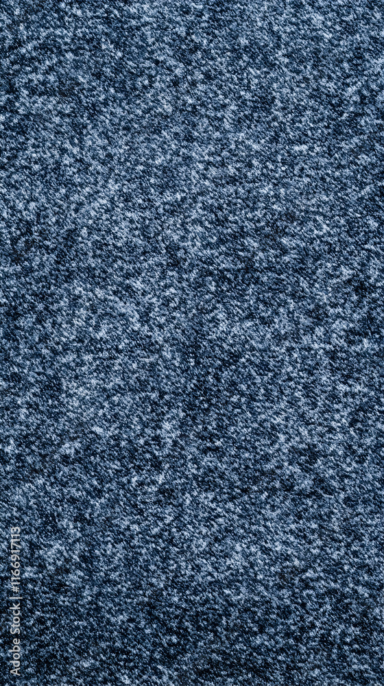 Close-up textured blue fabric surface. Background is blurred. Ideal for textile websites or design projects. Close-up textured blue fabric surface. Background is blurred. Ideal for textile websites or design projects.