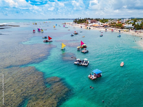 Porto de Galinhas - aerial view of the natural pools of Porto de Galinhas at low tide full of rafts