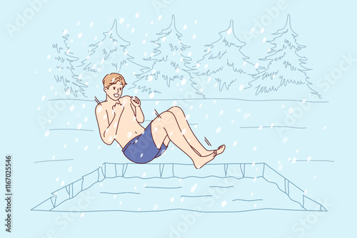 Man hardens himself by swimming in cold winter pond, jumping into icy water during snowfall. Guy hardens in forest bath to improve immunity and get ideal health helping to avoid colds and flu