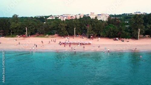 Aerial views showcasing the beauty of Shiluokou Beach on Weizhou Island during a sunny day photo