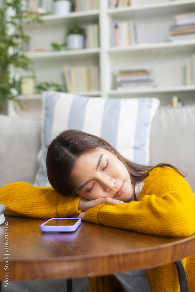 Attractive young Asian woman takes a nap resting peacefully during the weekend at home. Pretty young Asian woman daydreaming and taking a break for relief and refreshment during a calm nap at home. Attractive young Asian woman takes a nap resting peacefully during the weekend at home. Pretty young Asian woman daydreaming and taking a break for relief and refreshment during a calm nap at home.