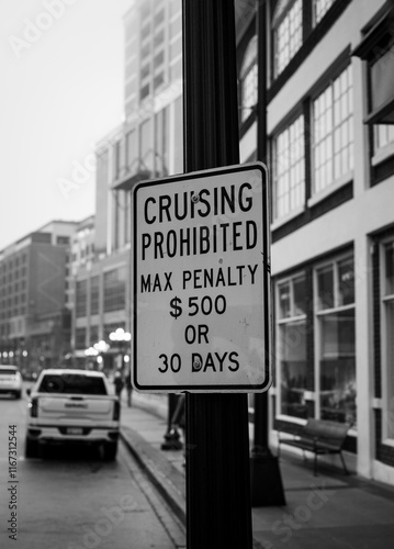 street sign in the city in black and white