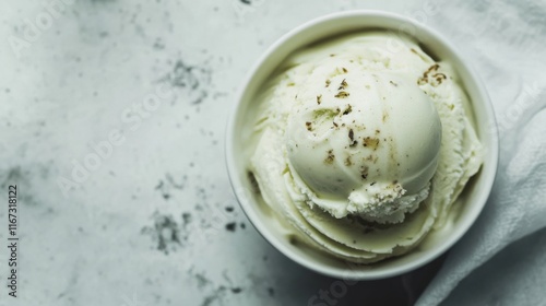 Aerial view of vanilla ice cream in bowl on white clean background