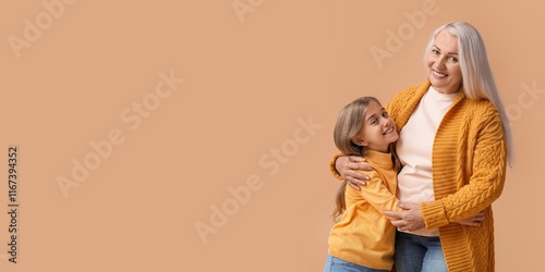 Little girl hugging her gra...