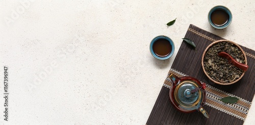 Composition with tasty puer tea on white background with space for text, top view photo