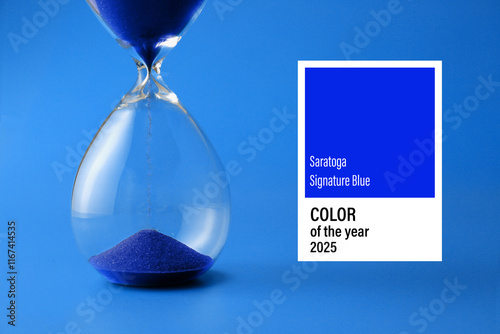Hourglass on color backgrou...