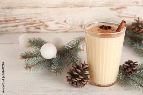 Creamy eggnog drink with ci...