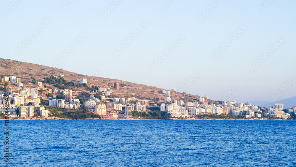 Stunning Albanian sunset over the sea, with Sarande seaside views. Stunning Albanian sunset over the sea, with Sarande seaside views.