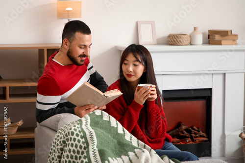 Young diverse couple relaxi...