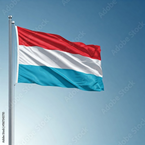 national flag of luxembourg, waving against blue sky, flag of the nation, blowing in the wind photo